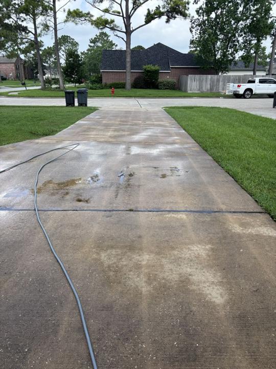 Driveway at the street before cleaning