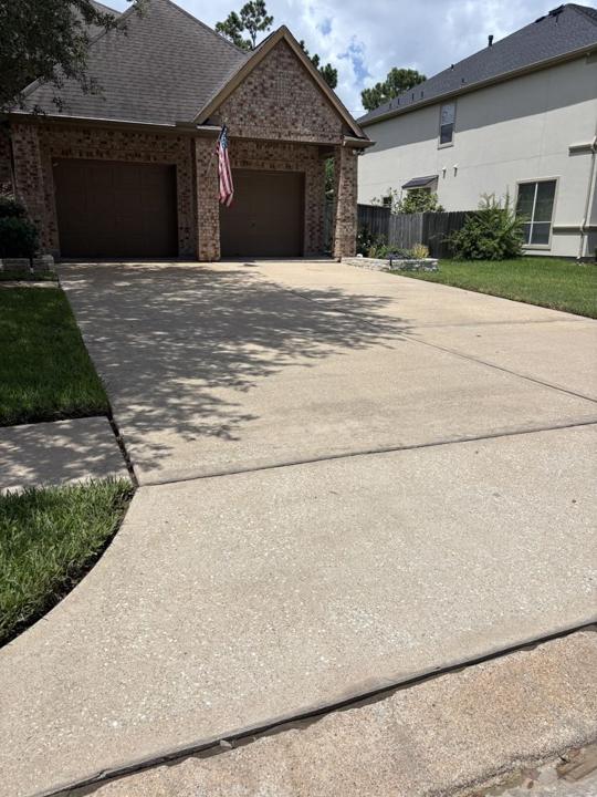 Two-car garage driveway after cleaning