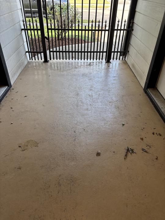 Covered entry porch before cleaning
