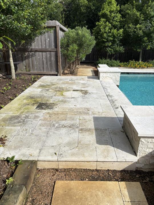 Travertine pool deck before cleaning