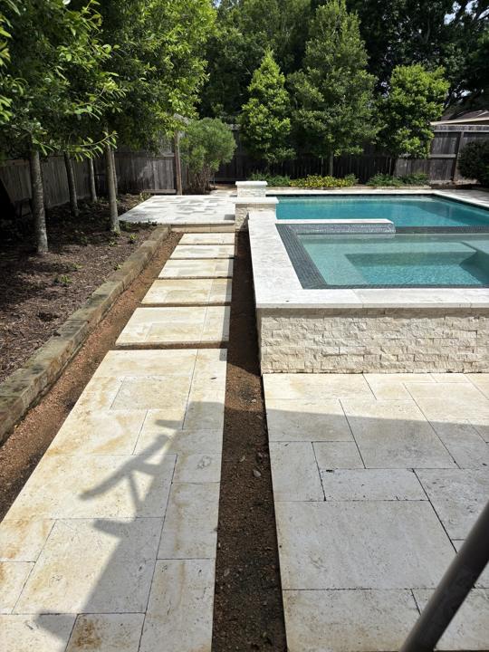 Travertine walkway and pool deck after cleaning