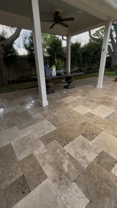 Covered travertine patio after cleaning