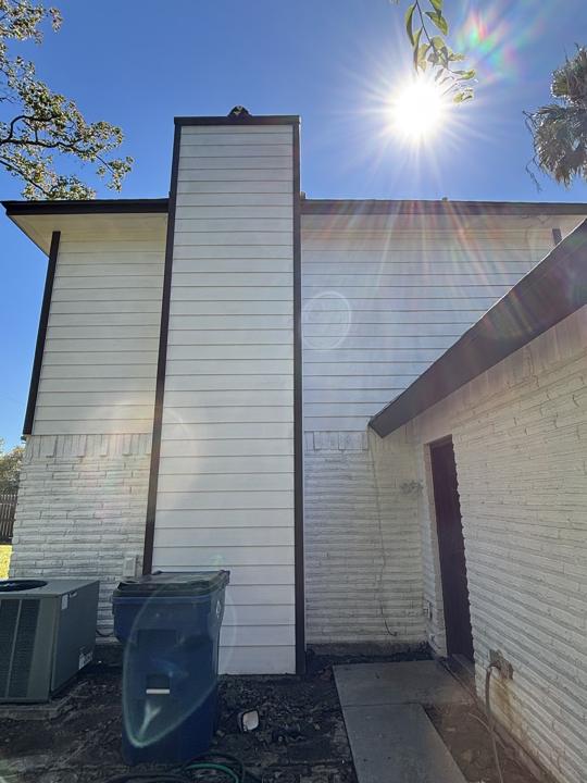 Chimney siding and trim after cleaning