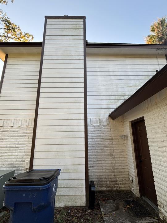 Chimney siding and trim before cleaning