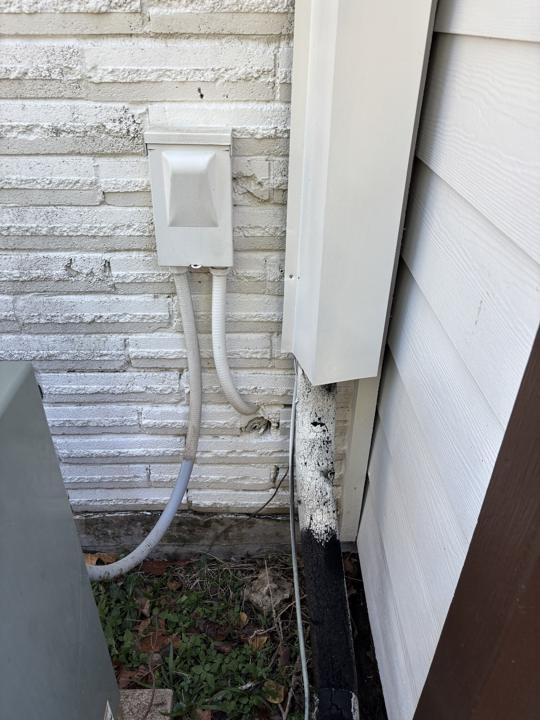 Electrical box and siding corner after cleaning