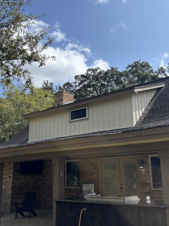 Board and batten dormer after cleaning