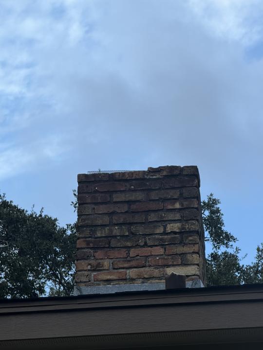 Brick chimney before cleaning