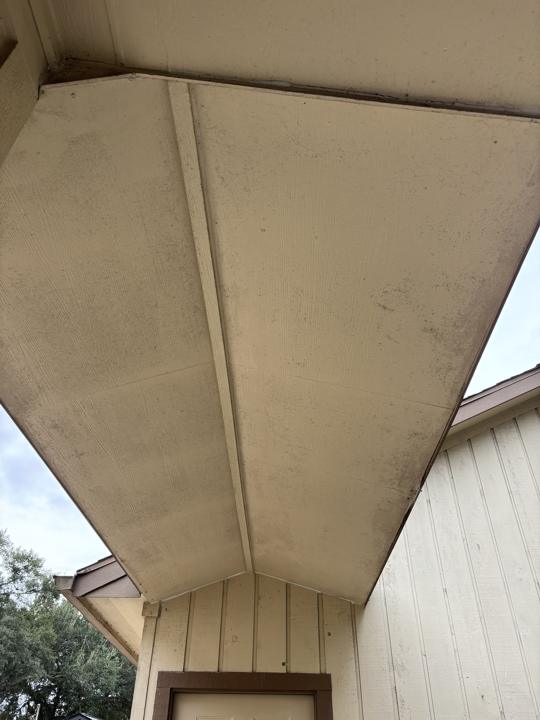 Porch soffit before cleaning