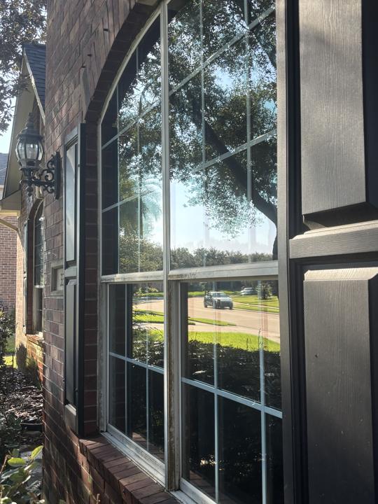 Arched window with lantern after cleaning