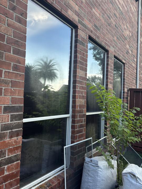 Brick wall windows before cleaning